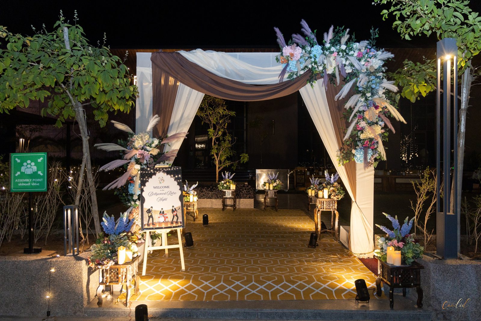 Bollywood Retro Night themed entrance styled with pampas grass and blooms