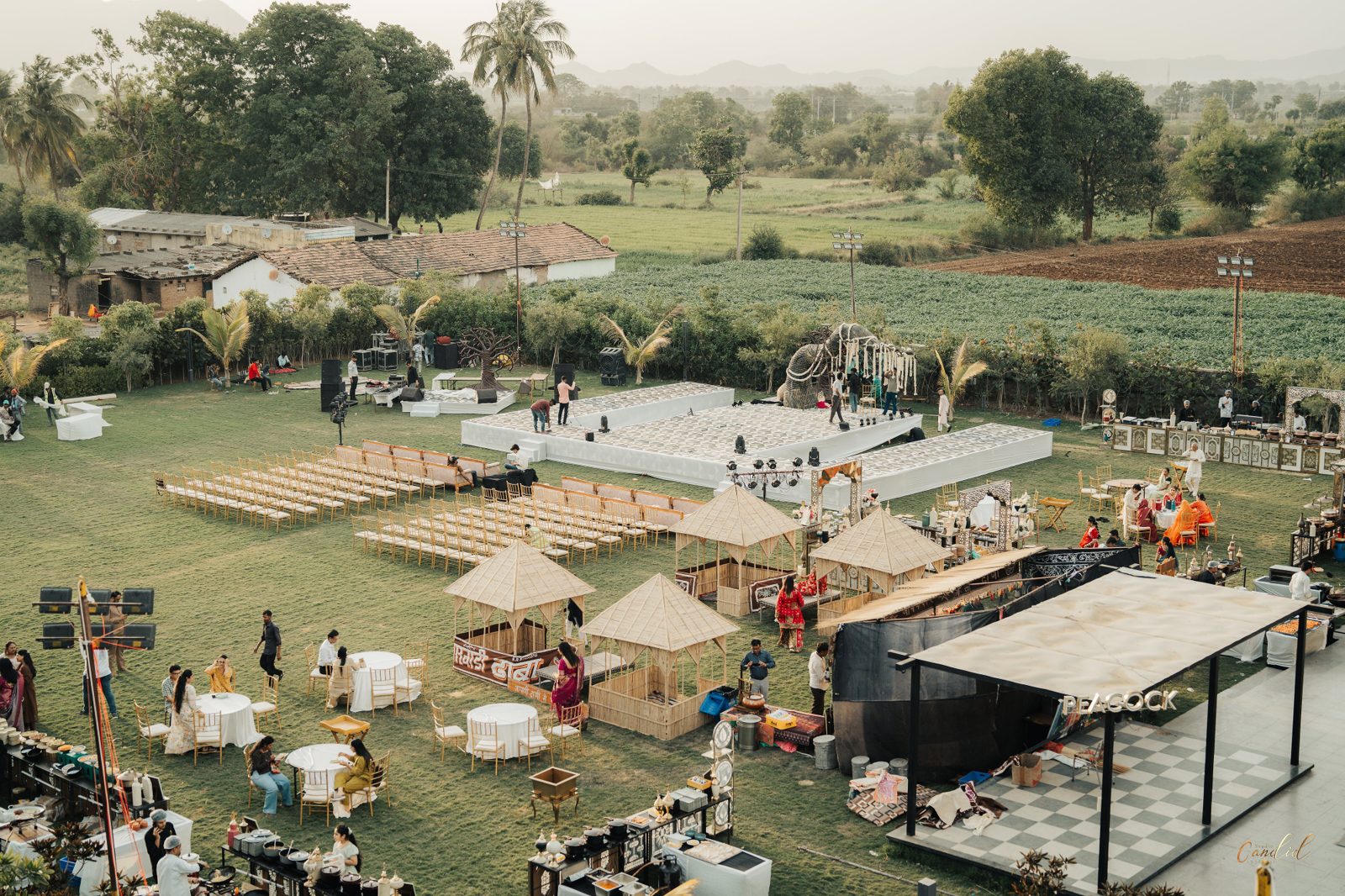 Aerial view of an outdoor countryside wedding venue fully set up